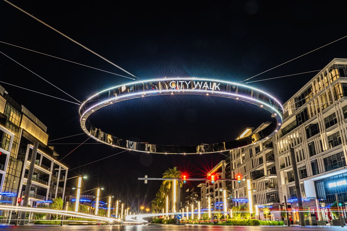 City Walk in Dubai at night with lights and modern architecture