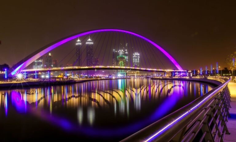 Illuminated Tolerance Bridge over the Dubai Water Canal at night