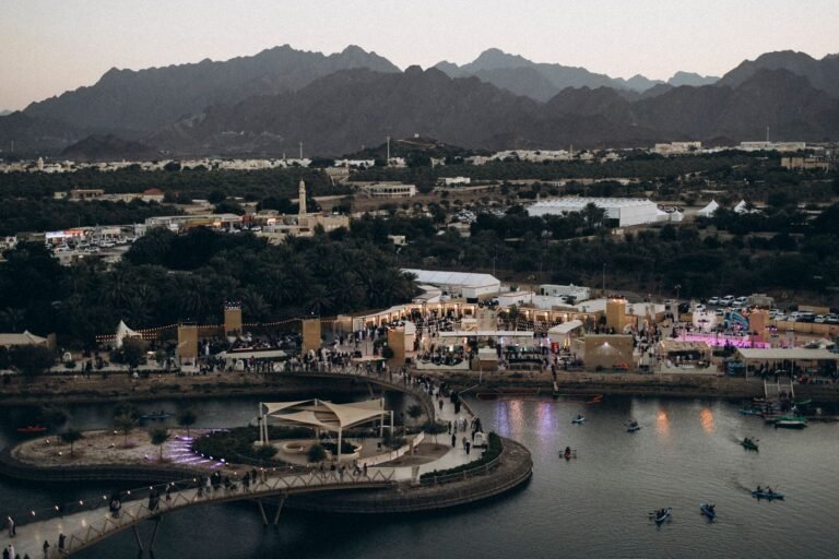 Aerial view of Hatta Lake surrounded by mountains near Dubai